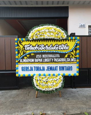 Papan Bunga Duka di Garuntang